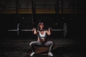 Woman Lifting Barbell